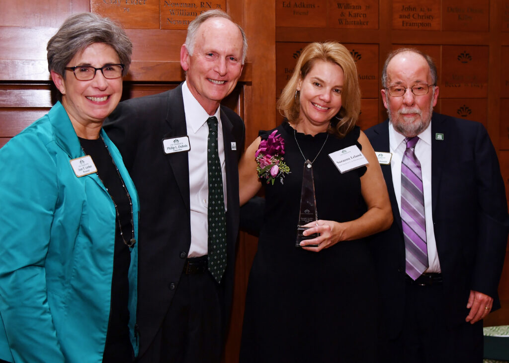 Provost Joan Lorden, Chancellor Philip Dubois, honoree Suzanne Leland and Graduate School Dean Tom Reynolds